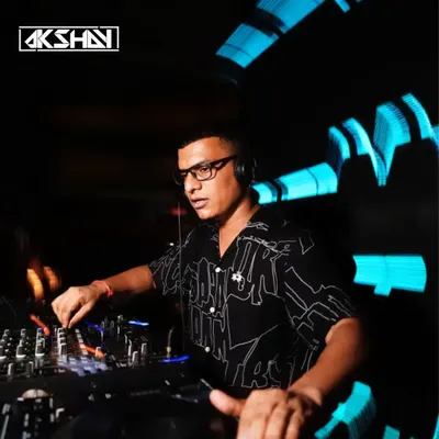 Locked in at the console, surrounded by the club's dynamic lighting. I focus on creating a seamless mix of house and techno tracks to keep the party going.