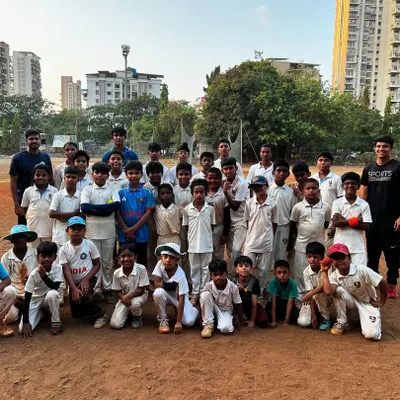 A group photo of our young cricketers with their coaches after a long and productive 8-month season. This picture captures the bond and progress made as a team.