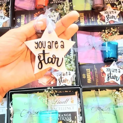 A simple way to celebrate your star employees. We designed these "You are a star" gift tags to accompany our employee recognition hampers, adding a personal touch of appreciation.