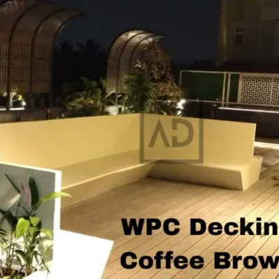 A beautiful terrace featuring my coffee-brown WPC decking. The built-in seating and planters are seamlessly integrated, creating a functional and stylish outdoor lounge area.