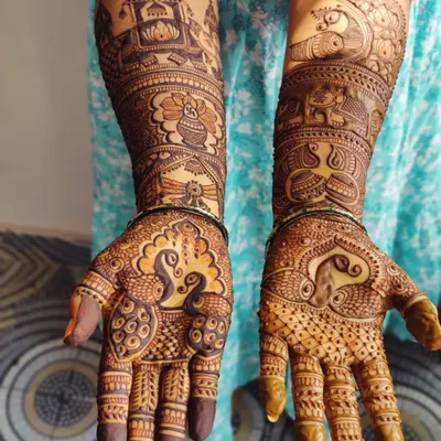 A classic full bridal mehendi, rich with details like peacocks, elephants, and palace architecture. This is the kind of intricate henna art I love to create.