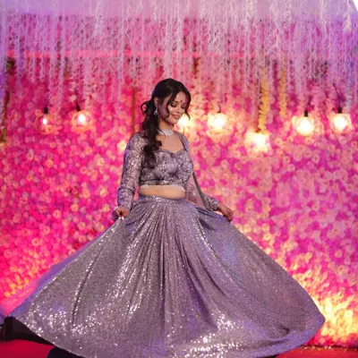 A beautiful bride twirling in her stunning sequined lehenga. A solo performance is the perfect opportunity for the bride to shine.