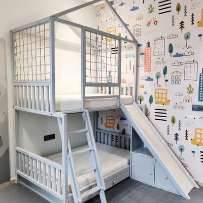 This custom bunk bed is a child's dream come true. It features a house-frame top bunk with safety netting, a sturdy ladder, and a slide for a fun way to wake up. The built-in drawers offer practical storage for toys and clothes.