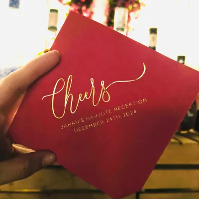 Every detail matters. For this Navjote, we created these elegant custom napkins with gold foil lettering, adding a sophisticated and personal touch to the bar experience.
