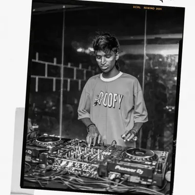 A black and white film-style shot from an April gig. Each month brings new events, new music, and new memories behind the decks.