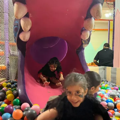 Sliding into a sea of colorful balls is always a highlight! Our monster-themed slide adds a touch of spooky fun to the adventure, especially during our Halloween events.