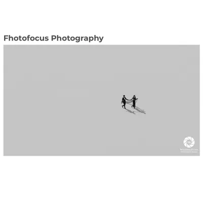 This is our award-winning shot for Black and White photography. The minimalist composition, inspired by our architectural background, uses negative space to draw the eye to the couple, creating a powerful and artistic statement about their journey together.