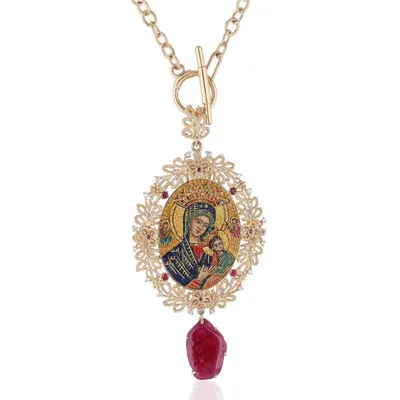 A micromosaic pendant depicting Madonna and Child, handcrafted in 18k gold. This piece is framed with natural diamonds and features a drop of raw Mozambique ruby from Gemfields. A piece for festive celebrations and quiet reflection.
