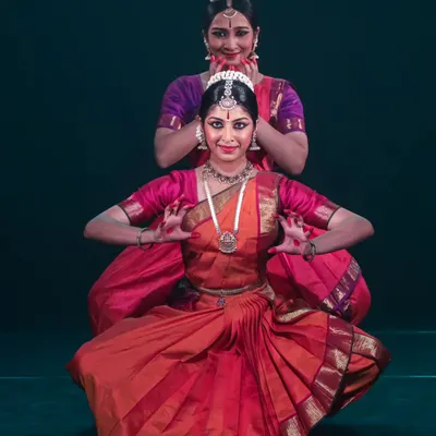 A perfectly symmetrical pose from a duet performance. In my group choreography, I emphasize precision and geometric patterns to create a powerful visual impact on stage.
