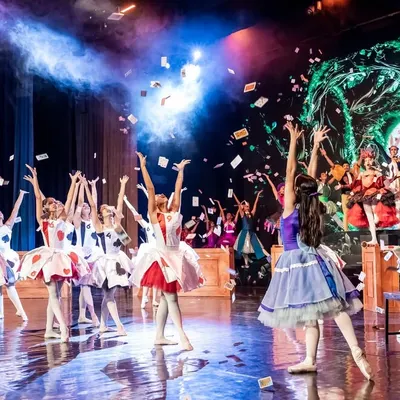 The grand finale of our "Alice in Wonderland" production. This scene showcases our ability to handle large-scale shows with complex choreography, a full cast of dancers, and dynamic effects like the flying cards.