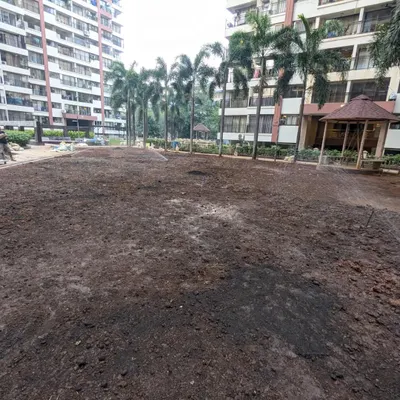 Before laying the turf, we ensure the ground is perfectly leveled and watered. This is the 6,500 sq. ft. site at Maple Leaf, Raheja Vihar, ready for its transformation.