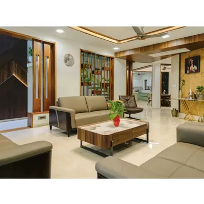 A different perspective of the modern living room, showing the wooden partition details and the open-plan connection to the dining area. The design focuses on creating distinct zones while maintaining a sense of flow.