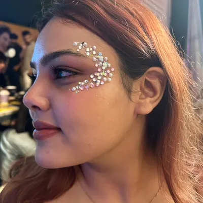 This crescent moon design made with multi-sized rhinestones is one of my most requested looks. It's so dreamy and adds a touch of magic to any face.