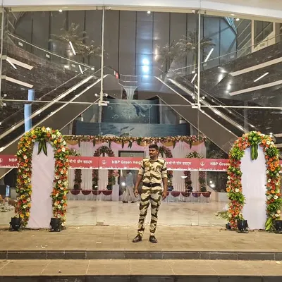 The grand entrance for the tribute event at ONGC. I created four large floral arches to frame the entrance, guiding guests towards the main hall and establishing a formal and respectful tone for the event.