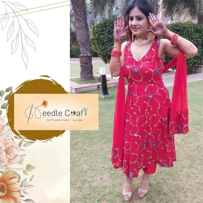 This vibrant red suit was created from an old saree for a client to wear on Karwachauth. I designed it as a comfortable yet festive Anarkali-style outfit, perfect for celebrating special moments.