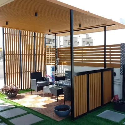 This client already had a pergola structure, so I renovated it with a new ceiling and added these slatted screens for privacy. It created a wonderful outdoor room for the family to enjoy nature together.