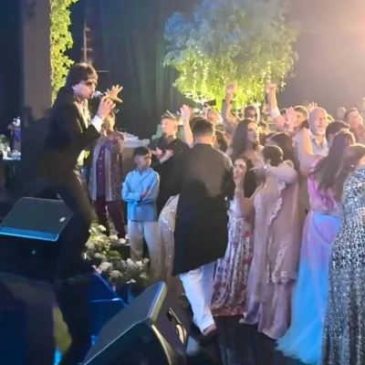 The party doesn't stop. Here I am, right in the middle of the crowd at a Bali wedding, making sure the energy is high and everyone is part of the celebration.