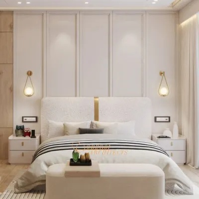 A beautifully symmetric bedroom design centered around a textured headboard and elegant wall paneling. The teardrop pendant lights add a touch of modern artistry, while the neutral palette promotes tranquility.