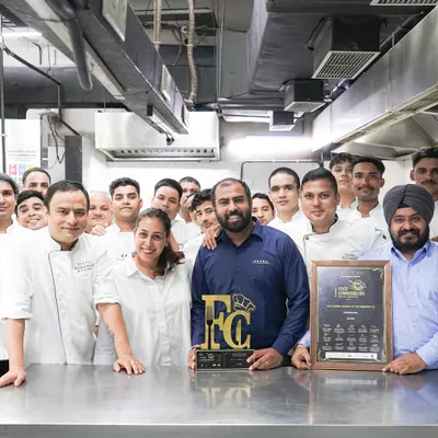 The entire CAARA team celebrating our "Best Luxury Caterer" award. This award is a testament to the hard work, dedication, and passion of every single member of our team.