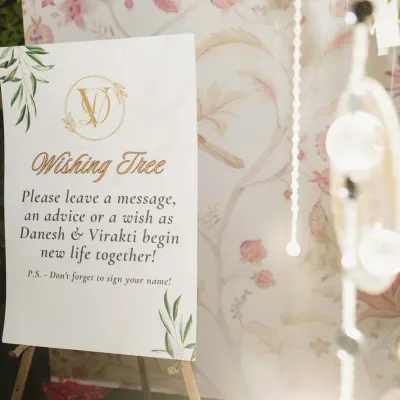 We set up a "Wishing Tree" for guests to leave messages, advice, or wishes for the happy couple. It's a beautiful, interactive element that becomes a cherished keepsake after the wedding.