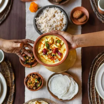 My best memories are around a dining table, sharing good, wholesome food. This spread shows some of my favorites that I can bring to your table: crisp Appams, Prawn Mango Curry from my aunt's recipe, and of course, Beef Ullarthu.