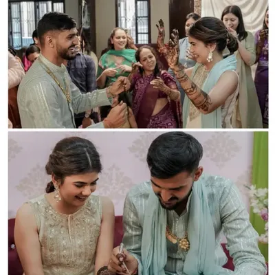 A candid moment from Harshita's mehendi ceremony, with the groom playfully applying henna. These are the fun memories that make a wedding special.