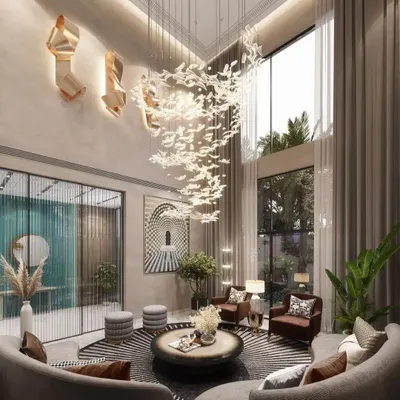 A double-height living room in a Rohtak residence, where a magnificent cascading chandelier and soaring windows create a sense of grandeur and connection to the outdoors. The curved seating arrangement encourages conversation and togetherness.