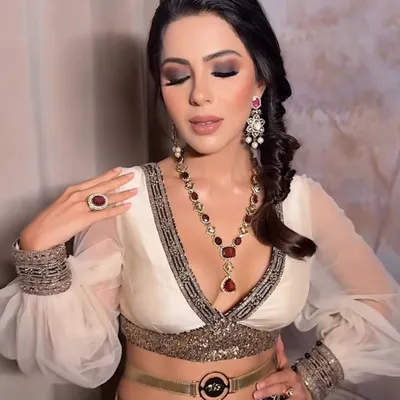 A deep, intense smokey eye created for a JJ Valaya shoot during India Couture Week. The eyes are the hero here, with rich, dark pigments blended seamlessly for a sultry and powerful effect.