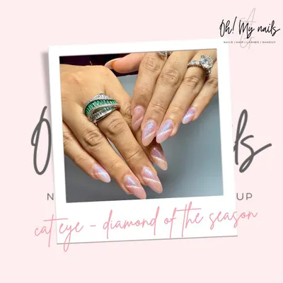 The diamond of the season. This holographic cat eye effect creates a stunning, multi-dimensional shimmer that shifts with the light, making your nails truly mesmerizing.
