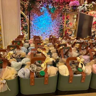 A large order of our signature faux leather tote bag hampers, ready for a wedding reception. We can handle bulk orders of any size, ensuring each return gift is packed with care and looks absolutely premium.