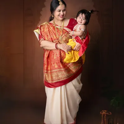 The timeless bond between mother and child, beautifully captured in our traditional 'Yashoda and Kanha' themed shoot.