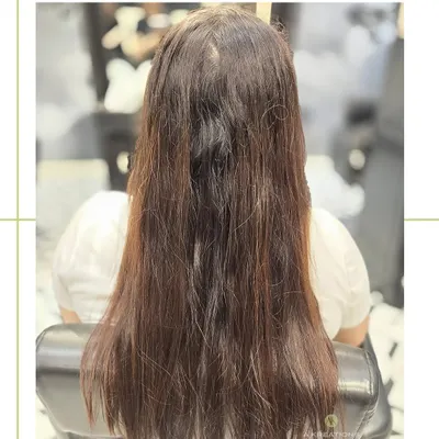 The "before" shot. This hair is ready for a transformation to tame frizz and restore its health.