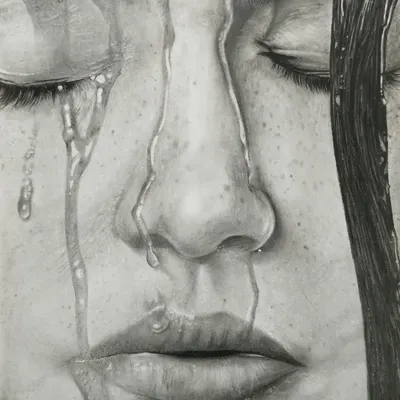 An incredibly detailed and emotional pencil sketch showing water trickling down a face. Our advanced drawing classes focus on hyper-realism and capturing textures like water.