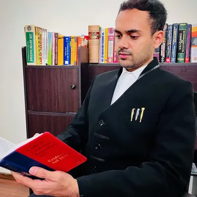 In my office, reviewing the Evidence Act. A lawyer's work never truly ends, as staying updated with the nuances of the law is critical to success.