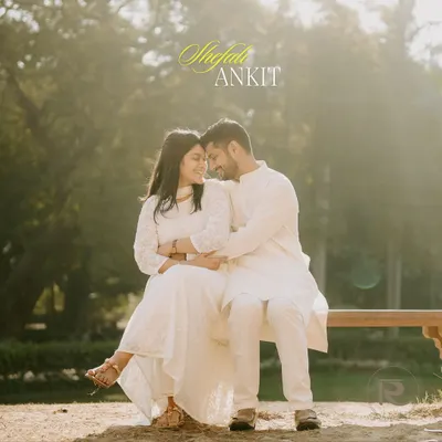 A soft and romantic portrait of a couple sharing an intimate moment on a park bench, bathed in the warm, golden light of the afternoon sun.