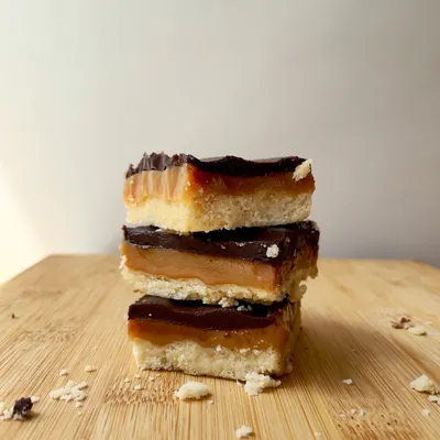 A stack of our delicious Regal Riches bars, a key component of our thoughtfully curated Rakhi indulgence hamper.
