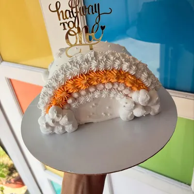 Halfway to one! Celebrating six sweet months with this adorable rainbow-shaped half-cake.
