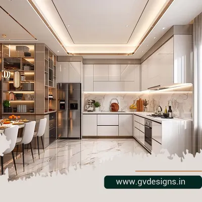 This L-shaped kitchen is the epitome of modern luxury, featuring handleless white cabinets, integrated cove lighting, and a stunning marble-patterned backsplash and floor. The open layout connects seamlessly with the dining area, making it perfect for entertaining.