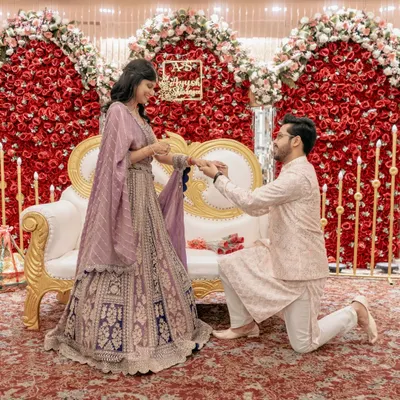 The moment he gets down on one knee. I capture this classic proposal shot against a stunning floral backdrop, ensuring the grandeur of the moment is preserved forever.