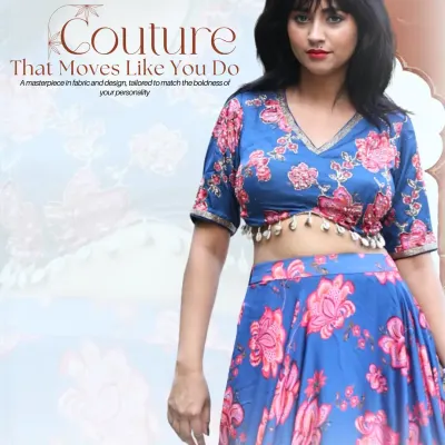 This vibrant blue lehenga with bold pink flowers is a favorite for mehendi functions. The V-neck blouse is accented with delicate shell tassels, and the flowing skirt is perfect for twirling.