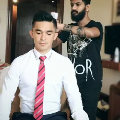 A classic, sharp look for the captain, leader, and legend, Sunil Chhetri. This is a behind-the-scenes shot of me styling him for a formal event, showcasing the clean lines and polished finish required for professional appearances.