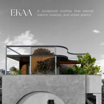 The sculptural rooftop of the EKAA project, where the landscape is designed to soften the architecture. Lush greenery and layered textures create a serene canopy that blends the building with the urban skyline.