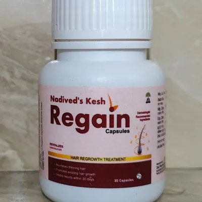 A close-up view of my Kesh Regain Capsules. This is a hair regrowth treatment designed to nourish thinning hair and promote the growth of existing hair from within.