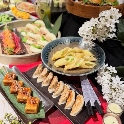 A beautiful spread of our catering offerings. From gyoza and agedashi tofu to fresh salads and bao, we can bring a complete Ebisu experience to your home or office.