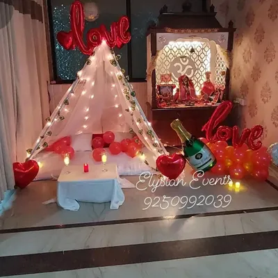I can transform any room into a romantic retreat with this cozy canopy tent setup. It includes warm fairy lights, red heart-shaped balloons, and soft bedding for a memorable anniversary or proposal surprise.