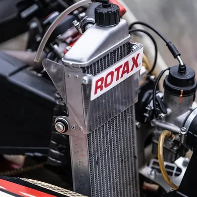 The heart of the machine. A close up of a Rotax engine radiator, a critical component for keeping the engine cool during intense racing conditions.