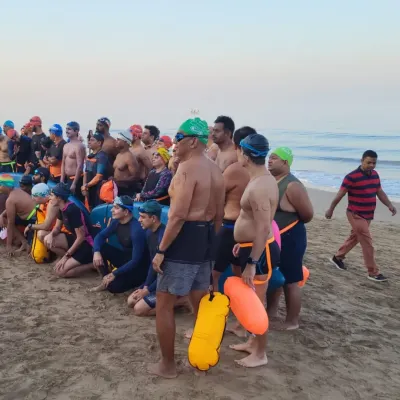 The team gathers on the sand before the 90 Minute Ultimate Sea Swimming Challenge. This is a moment of focus and shared purpose before we face the water together.