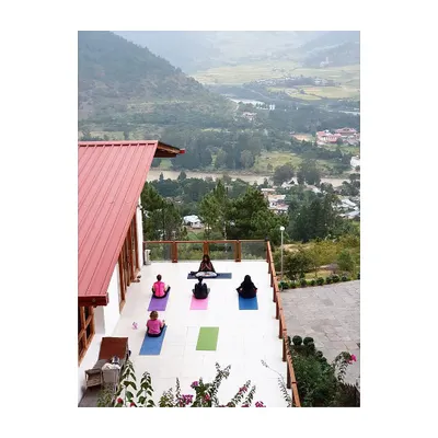 Our yoga shala in the sky. During our Bhutan retreat, we practice together overlooking the Punakha valley, with views of the historic dzong and the meeting of two rivers. This outdoor group setting is the perfect space to breathe, move, and feel connected to nature.