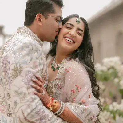 A stolen moment of pure happiness. I love capturing the candid laughter that happens when you forget the camera is even there. This is the essence of Heena and Shlok's joyful connection.