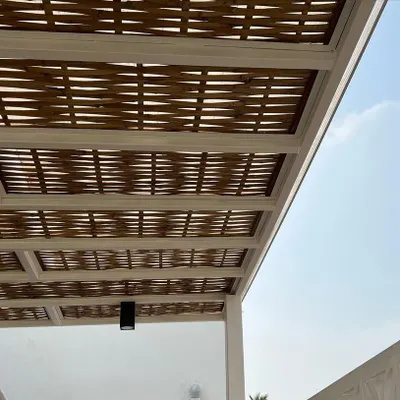 I love the detail in this hand-woven bamboo pergola. It provides about 80% shade from the sun and is protected with a polycarbonate sheet, making it both beautiful and practical.